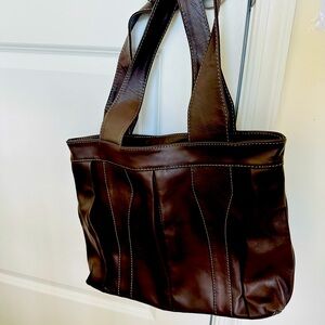 Brown color medium size women’s hand bag